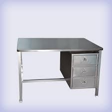 Office Table made of SS304 Steel with three side shelf and foot rest. Customizable according to requirement.