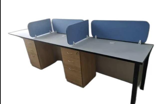 Partition Modular Office Workstation Manufacturers in AhmedabadWe also supply in Ahmedabad, Amreli, Banaskantha, Bharuch, Bhavnagar, Dang, Jamnagar, Junagadh, Kheda, Kachchh, Mehsana, Panchmahal, Rajkot, Sabarkantha, Surat, Surendranagar and Vadodara.Seating Capacity	3 SeaterMaterial	WoodenIt is lockable	YesTable Height	3 FeetNo Of Drawer	3 DrawerPartition Color	BlueTable Shape	RectangularTable Color	White1)25.mm Top All Side 2.mm PVC Edged Banding.2)50x50 Leg. TAI MEMBER3)18.mm MODESTY.4)30.mm SCREEN & 3 DRAWER PEDESTAL.5)COLOUR AS PER CUSTOMER REQUEREMENT.