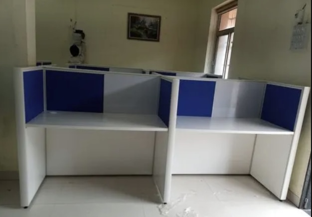 Modular Wooden Office Workstation Manufacturers in AhmedabadWe also supply in Ahmedabad, Amreli, Banaskantha, Bharuch, Bhavnagar, Dang, Jamnagar, Junagadh, Kheda, Kachchh, Mehsana, Panchmahal, Rajkot, Sabarkantha, Surat, Surendranagar and Vadodara.Seating Capacity 4-SeaterMaterial WoodenColor WhiteSize 4ft(Height)Finishing Type PolishedPattern PlainTable Shape RectangularMODULAR WOODEN BACK TO BACK W/S1)25. Mm top, all side 2. Mm pvc edged banding.2)60mm Partition on the upper side of table top soft board & writing board with powder coating.3)60.mm return partition with aluminum frame & raceway.4)We give electrical point.