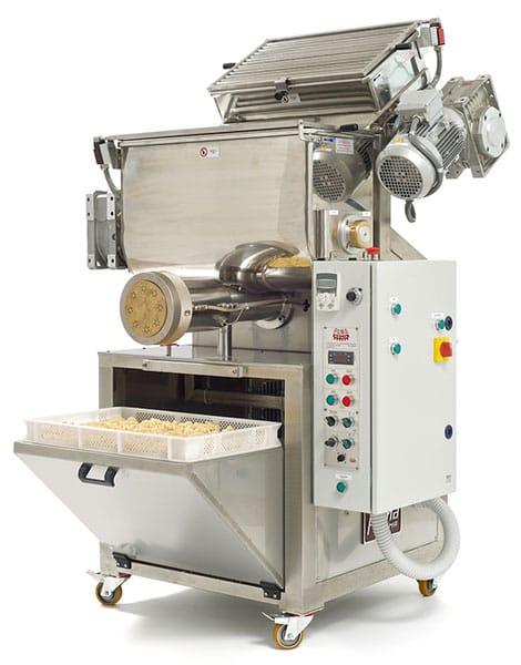 A Macaroni Pasta Making Machine in Noida is designed to automate the production of macaroni pasta, offering efficiency and consistency in manufacturing. These machines are essential for businesses in the food processing industry that aim to meet the high demand for pasta products. Located in Noida, a hub for industrial and manufacturing activity, several companies specialize in producing these machines, incorporating advanced technology to ensure high-quality output.The process typically begins with mixing semolina or refined wheat flour with water to form dough. This dough is then extruded through molds, which shape it into various pasta forms like macaroni. The machine is designed to perform multiple tasks, including mixing, kneading, extruding, cutting, and drying the pasta to the desired texture and quality. Modern machines are equipped with automation features that control temperature, speed, and cutting sizes, ensuring that each batch is uniform.Manufacturers in Noida provide both semi-automatic and fully automatic macaroni pasta making machines to cater to different production scales. The machines are built with durable materials like stainless steel to ensure longevity and easy maintenance. Given the rise in pasta consumption, these machines are becoming increasingly popular among food processors looking to expand their operations and cater to the growing market demand.