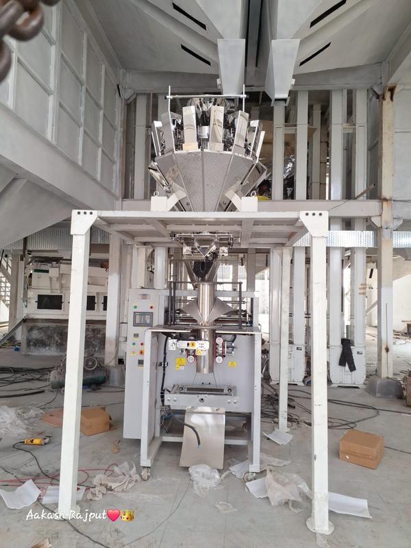 Fully-Automatic Collar-Type Load-Cell based High-Speed Multi Head Weigher Machine for Seeds Pouch Packaging.
