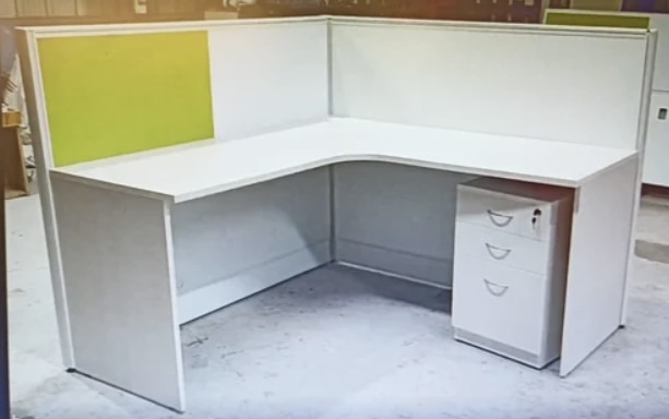 L Shape Executive Office Table Manufacturers in AhmedabadWe also supply in Ahmedabad, Amreli, Banaskantha, Bharuch, Bhavnagar, Dang, Jamnagar, Junagadh, Kheda, Kachchh, Mehsana, Panchmahal, Rajkot, Sabarkantha, Surat, Surendranagar and Vadodara.Material	PARTICAL BOARDShape	L ShapedStorage	With StorageStorage Type	Drawer StorageTable Top Material	Engineered WoodSuitable For	OfficeColour	ALLFinish Type	MatteStyle	ModernL SHAPE TABLE1)50mm aluminium frem partition base below table top racewey  2)25. Mm top, all side 2. Mm pvc edged banding3)18. Mm vartical with 3 DRAWER PEDESTRAL4)table top soft board & writing board 5)electrical point & all mead in               partical board.  6)colours as per the customer requrementAdditional Information:Delivery Time: 20DEY