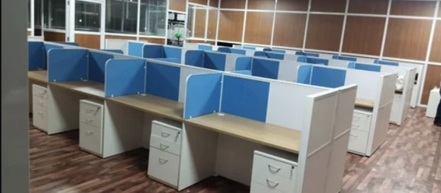 Linear Office Workstation Manufacturers in AhmedabadWe also supply in Ahmedabad, Amreli, Banaskantha, Bharuch, Bhavnagar, Dang, Jamnagar, Junagadh, Kheda, Kachchh, Mehsana, Panchmahal, Rajkot, Sabarkantha, Surat, Surendranagar and Vadodara.Seating Capacity	4 SeaterColor	BrownMaterial	WoodenShape	LinearStorage Drawers	Pedestal DrawerTable Height	2.5 FeetCountry of Origin	Made in India60. Mm partition back to back linear workstations.1)top 25. Mm all side 2. Mm pvc edged banding.2)18. Mm divider & 60. Mm partition on the  upper side of table top soft board & writing board.3)18. Mm divider & 60.mm return partition with aluminium frame, raceway.4)3drawer pedestal.5) use telecop channel &we gives electrical point.6)linear workstation colours as per the customer requrement.   Additional Information:Production Capacity: 500Delivery Time: 15dey