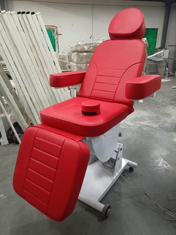 A motorized dermatology chair is a specialized, adjustable chair designed for dermatological procedures, examinations, and treatments. It features an electric motor system that allows smooth, precise adjustments to enhance patient comfort and provide optimal positioning for medical professionals.Key Features:1. Motorized Adjustments – Electrically controlled height, backrest, leg rest, and tilt functions.2. Multi-Positioning – Allows reclining, Trendelenburg (tilt), and fully flat positions for various procedures.3. High-Quality Upholstery – Made of medical-grade, easy-to-clean material for hygiene and durability.4. Adjustable Armrests & Headrest – Provides additional comfort and flexibility.5. Weight Capacity – Typically supports 150-250 kg, depending on the model.6. Footswitch or Hand Remote Control – Enables effortless position adjustments.7. Stable & Sturdy Base – Ensures safety and prevents tipping.8. Optional Features – Some models include memory settings, heating, or massage functions.Common Uses:Dermatology and cosmetic treatmentsMinor surgical proceduresLaser treatments and aesthetic proceduresHair transplantationGeneral medical examinations