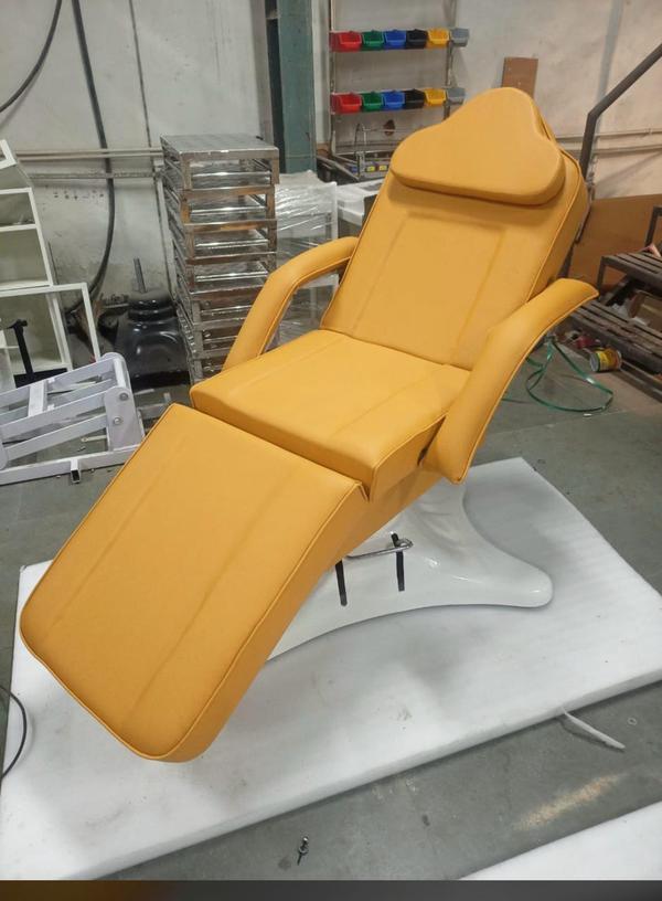A dermatology chair (hydraulic) is a specialized medical chair designed for dermatology procedures, skin treatments, and minor cosmetic surgeries. It features a hydraulic height adjustment system, allowing easy raising and lowering of the chair for patient comfort and practitioner convenience.Key Features:Hydraulic Height Adjustment: Smooth, foot-operated or hand-operated hydraulic pump for height control.Adjustable Backrest & Leg Rest: Can recline and position the patient comfortably for various treatments.360° Rotation (Some Models): Allows for easy access from different angles.Cushioned Upholstery: High-density foam with medical-grade, easy-to-clean material (PU leather or vinyl).Sturdy Base: Heavy-duty steel or chrome base for stability.Armrests (Removable/Adjustable): Some models feature movable armrests for better accessibility.Weight Capacity: Typically supports 250–400 lbs depending on the model.These chairs are used in dermatology clinics, med spas, and cosmetic treatment centers for procedures like laser treatments, skin examinations, botox, fillers, and minor surgical interventions.