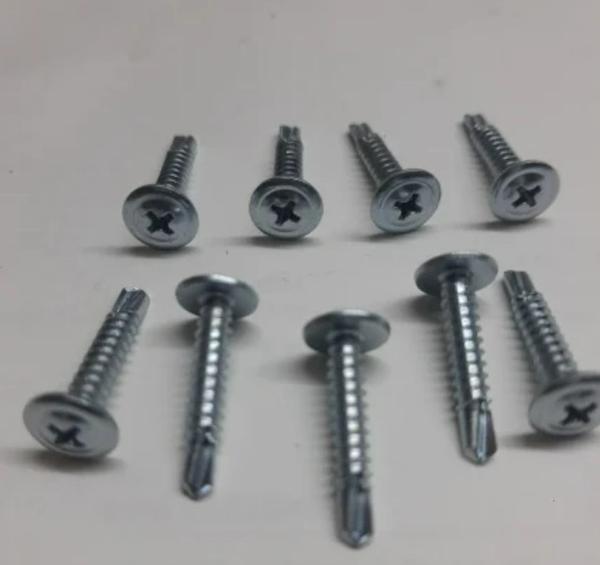 HP Self Drilling Screw Truss Head 4.8X50Material	Alloy SteelSize	4.8X50This Self Drilling Screw is made of excellent quality mild steel material and features a Round Head, which is a fastener designed to simplify the joining of sheets of metal to various materials or even metal to metal. With a sharp, drill-like point, it can create its own pilot hole as it is driven, reducing the need for pre-drilling. These versatile screws find frequent use in construction, metalworking, and woodworking applications where they provide efficient and secure fastening, especially when connecting metal sheets, facilitating faster and more convenient installations.