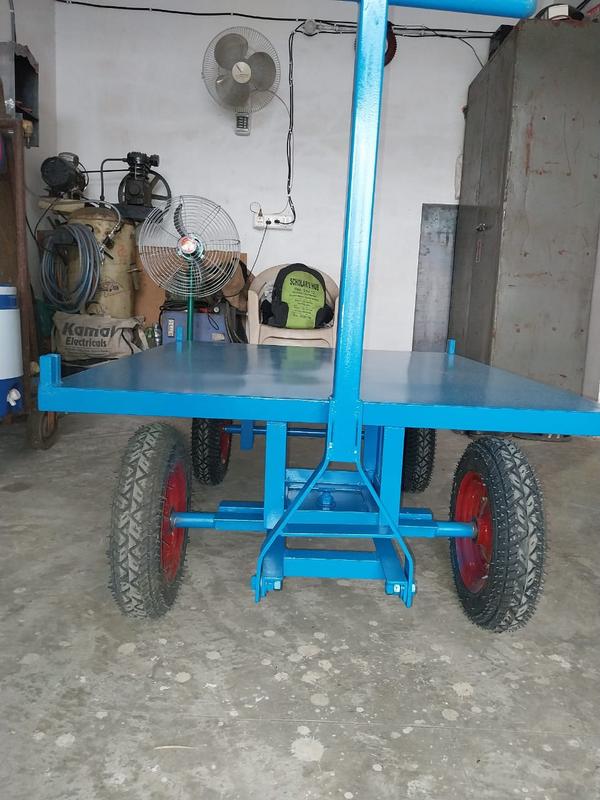 Mild Steel Platform Trolley Manufacturers in AhmedabadWe are also supply in Andhra Pradesh, Arunachal Pradesh, Assam, Bihar, Chhattisgarh, Goa, Gujarat, Haryana, Himachal Pradesh, Jharkhand, Karnataka, Kerala, Madhya Pradesh, Maharashtra, Manipur, Meghalaya, Mizoram, Nagaland, Odisha, Punjab, Rajasthan, Sikkim, Tamil Nadu, Telangana, Tripura, Uttar Pradesh, Uttarakhand, and West Bengal1. General SpecificationsType: Manual Push / Pull TrolleyMaterial: Mild Steel (MS)Operation Mode: Hand-OperatedUsage: Transporting Goods, Warehouse & Industrial Use2. Load CapacityCapacity Range: 150 kg to 2000 kg (Customizable)Platform Size (L x W): 600 mm x 400 mm to 1500 mm x 1000 mmPlatform Height: 150 mm to 300 mm3. Structural DetailsFrame Material: Heavy-Duty Mild SteelPlatform Type: Plain / Chequered / Mesh / PerforatedFinish: Powder Coated / Painted / GalvanizedHandle Type: Fixed / Foldable / Detachable4. Wheels & MobilityWheel Type: Rubber / PU (Polyurethane) / Nylon / Cast IronWheel Diameter: 100 mm to 300 mmNumber of Wheels: 2 Fixed + 2 Swivel / 4 SwivelBearing Type: Ball Bearing for Smooth Movement5. Additional FeaturesBrakes: Optional Locking System on Swivel WheelsSide Railings: Available for Extra SecurityCustomization: Available for Size, Handle Type, and Wheel MaterialAnti-Corrosion Coating: For Long Durability