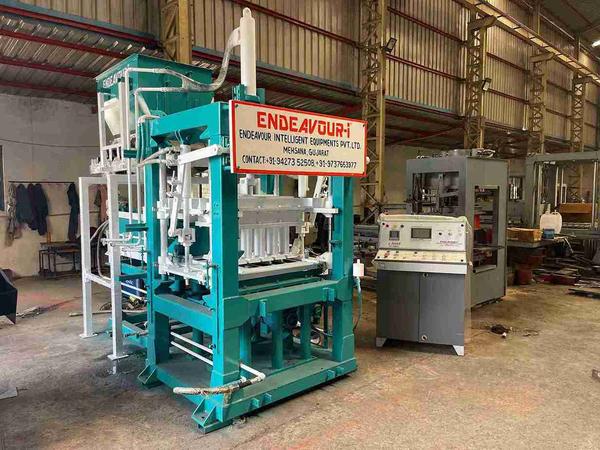 Hydraulic Vibro Compacting Type Automatic Concrete Blocks Plant / Automatic Concrete Blocks Making MachineMulti Product Machine to Produce Fly Ash Bricks, Cement Bricks, Concrete Solid Blocks, Concrete Hollow Blocks, Concrete Paver Blocks, Concrete Paver Blocks with Color Face etc…Concrete Block MachineConcrete Blocks MachineConcrete Block PlantConcrete Blocks PlantConcrete Block Making MachineConcrete Blocks Making MachineConcrete Block Making PlantConcrete Blocks Making PlantAutomatic Concrete Block MachineAutomatic Concrete Blocks MachineAutomatic Concrete Block PlantAutomatic Concrete Blocks PlantAutomatic Concrete Block Making MachineAutomatic Concrete Blocks Making MachineAutomatic Concrete Block Making PlantAutomatic Concrete Blocks Making PlantModel: ENDEAVOUR-iC2000Production Capacity: 10 Bricks per Stroke / 1800-2000 Bricks per HourStandard Bricks Size: 230 X 110 X 75 mm (Size Options Available)Vibration: Oil Filled Box Type High Speed Vibration Controlled by VFDPan Mixer Capacity: 750 Kgs per Batch – 1 MixerHydraulic Tank Capacity: 250 LtrsControl Panel: User Friendly PLC Based Control Panel with Touch Screen Display and Touch Screen Type HMI Display Pallet Size: 570 X 720 X 19 mmConnected Power: 38.00 HP / 28.05 KW / 3 Phase / 440 Volts / 50 Htz