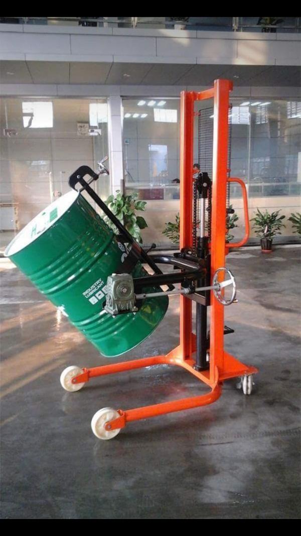 Manual Hydraulic Drum Tilter and Lifter Truck Manufacturers in Rajasthan/AhmedabadWe are also supply in Andhra Pradesh, Arunachal Pradesh, Assam, Bihar, Chhattisgarh, Goa, Gujarat, Haryana, Himachal Pradesh, Jharkhand, Karnataka, Kerala, Madhya Pradesh, Maharashtra, Manipur, Meghalaya, Mizoram, Nagaland, Odisha, Punjab, Rajasthan, Sikkim, Tamil Nadu, Telangana, Tripura, Uttar Pradesh, Uttarakhand, and West BengalA Manual Hydraulic Drum Tilter and Lifter Truck is a specialized material-handling equipment designed to lift, tilt, and transport heavy drums safely and efficiently. It operates using a manual hydraulic pump to raise the drum and a tilting mechanism to pour or reposition its contents with controlled movement. This versatile tool is widely used in industries such as chemicals, pharmaceuticals, food processing, and manufacturing, where liquid or granular materials need to be handled. Equipped with secure clamping mechanisms and ergonomic handles, it ensures operator safety and minimizes manual effort. With its compact design and high load capacity, it enhances workplace efficiency while reducing the risk of spills and injuries.