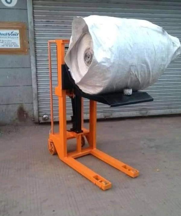 Hydraulic Manual Reel Stacker Manufacturers in Rajasthan/AhmedabadWe are also supply in Andhra Pradesh, Arunachal Pradesh, Assam, Bihar, Chhattisgarh, Goa, Gujarat, Haryana, Himachal Pradesh, Jharkhand, Karnataka, Kerala, Madhya Pradesh, Maharashtra, Manipur, Meghalaya, Mizoram, Nagaland, Odisha, Punjab, Rajasthan, Sikkim, Tamil Nadu, Telangana, Tripura, Uttar Pradesh, Uttarakhand, and West BengalA hydraulic manual reel stacker is a versatile material handling equipment designed for lifting, transporting, and stacking heavy reels with ease. It is commonly used in industries such as printing, paper manufacturing, and packaging, where efficient reel handling is essential.This stacker operates using a manual hydraulic system, where the operator pumps a hydraulic lever to lift the reel to the desired height. The controlled lifting mechanism ensures smooth and stable movement, reducing the risk of damage to the reels during handling.One of the main benefits of a hydraulic manual reel stacker is its cost-effectiveness. Since it does not require electricity, it is an economical solution for businesses looking to optimize material handling without increasing energy consumption.Hydraulic manual reel stackers come in different models to accommodate various reel sizes and weights. Some models feature adjustable cradles, clamps, or V-shaped platforms to securely hold the reels in place, preventing slips or accidental falls during movement.