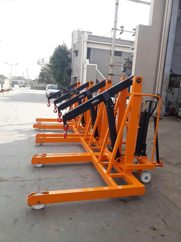 Hydraulic Floor Crane Manufacturers in Rajasthan/AhmedabadWe are also supply in Andhra Pradesh, Arunachal Pradesh, Assam, Bihar, Chhattisgarh, Goa, Gujarat, Haryana, Himachal Pradesh, Jharkhand, Karnataka, Kerala, Madhya Pradesh, Maharashtra, Manipur, Meghalaya, Mizoram, Nagaland, Odisha, Punjab, Rajasthan, Sikkim, Tamil Nadu, Telangana, Tripura, Uttar Pradesh, Uttarakhand, and West BengalA hydraulic floor crane is a powerful lifting device designed to handle heavy loads in workshops, warehouses, and industrial settings. It operates using a hydraulic system that allows for smooth and controlled lifting, making it ideal for moving heavy machinery, automotive parts, and other bulky materials. Its compact yet sturdy design ensures easy maneuverability in confined spaces.One of the key benefits of a hydraulic floor crane is its effortless lifting mechanism. The hydraulic system allows operators to raise and lower heavy loads with minimal physical effort, reducing strain and workplace injuries. This makes it a preferred choice for industries where frequent heavy lifting is required.Portability and flexibility are standout features of these cranes. Equipped with swivel casters or heavy-duty wheels, they can be easily moved to different locations within a workshop or warehouse. Some models also feature a foldable design, making storage convenient when the crane is not in use.The high load-bearing capacity of hydraulic floor cranes makes them suitable for lifting a variety of heavy objects. Depending on the model, they can lift anywhere from a few hundred kilograms to several tons, making them ideal for handling engines, metal components, and industrial equipment.