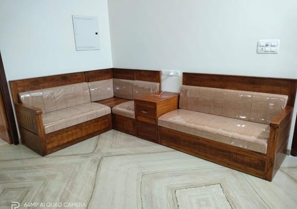 TODAY INFORMATION = Teak trees that are older, between 40 and 80 years old, provide the best woodA teak wood with cushion corner sofa set is a stylish and durable furniture option that combines the natural beauty of teak wood with the comfort of cushioned seatingTeak Wood Frame:Teak is a high-quality, durable hardwood known for its resistance to moisture, pests, and decay.It has a rich, golden-brown colour that can age gracefully to a silvery patina if left untreated.The wood is often used for outdoor and indoor furniture due to its strength and longevity.Corner Design:The corner sofa set is designed to maximise seating space and fit neatly into the corner of a room or patio.It often includes a combination of armchairs, love-seats, and corner pieces to create a modular setup.Cushioned Seating:The cushions are typically made from high-density foam for comfort and durability.Upholstery options include weather-resistant fabrics for outdoor use or luxurious fabrics for indoor settings.Versatility:Suitable for both indoor (living rooms, lounges) and outdoor (patios, gardens) use, depending on the design and materialsBenefits:Durability: Teak wood is long-lasting and can withstand harsh weather conditions, making it ideal for outdoor use.Aesthetic Appeal: The natural grain and colour of teak wood add a touch of elegance to any space.Comfort: The cushioned seating provides a cosy and inviting seating area.Low Maintenance: Teak requires minimal maintenance, especially when used outdoors. Periodic cleaning and occasional oiling can help maintain its appearancePopular In Styles:Modern: Sleek lines, minimalist design, and neutral-coloured cushions.Rustic: Natural teak finish with earthy-toned cushions for a cosy, organic feel.Contemporary: Combines teak wood with bold cushion colours and patterns for a trendy look.Care Tips:For Teak Wood:Clean with a mild soap and water solution to remove dirt and grime.Apply teak oil periodically if you want to maintain the golden-brown colour (optional).For outdoor furniture, consider using a protective cover during extreme weather conditions.For Cushions:Use removable, washable covers for easy cleaning.For outdoor cushions, ensure they are made from weather-resistant materials and store them indoors during prolonged bad weather.