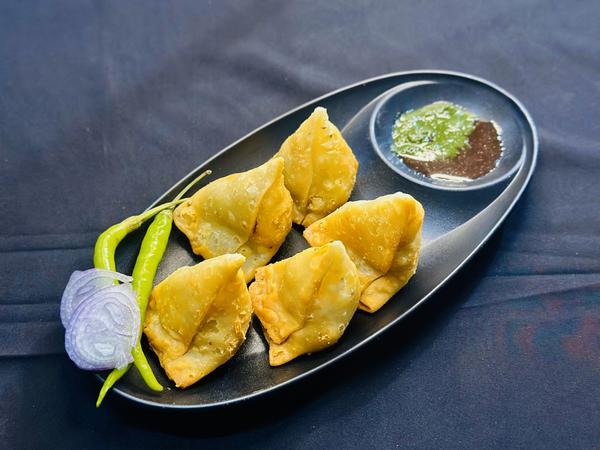IN INDIAIN GUJARATIN AHMEDABADFrozen Samosa: A Crispy, Flavorful Treat at Patidar BrothersIndulge in the authentic taste of crispy, golden samosas with Patidar Brothers' premium frozen samosas! Made with high-quality ingredients and packed with flavorful fillings, our frozen samosas bring the traditional Indian snack to your home with convenience and ease. Whether you're hosting a gathering, craving a quick snack, or looking for the perfect party appetizer, our frozen samosas are the ultimate choice.Why Choose Patidar Brothers’ Frozen Samosas?Authentic Taste: Enjoy the rich, traditional flavors of India in every bite.Premium Quality: Made with fresh ingredients, a crispy outer shell, and deliciously spiced fillings.Quick & Easy to Prepare: Ready in minutes—simply fry, air-fry, or bake for a perfectly crispy treat.Variety of Fillings: Choose from classic potato and peas, spicy paneer, flavorful chicken, or other delightful options.Perfect for Any Occasion: Ideal as a snack, party appetizer, or accompaniment to tea and chutney.Easy Preparation MethodsDeep Fry: Heat oil to 350°F (175°C) and fry the samosas until golden brown and crispy.Air Fry: Preheat to 375°F (190°C) and air fry for 10-12 minutes, flipping halfway.Bake: Preheat the oven to 375°F (190°C) and bake for 15-18 minutes until golden and crisp.Stock up on Patidar Brothers’ frozen samosas today and enjoy the authentic taste of India in every bite. Quick, delicious, and hassle-free!