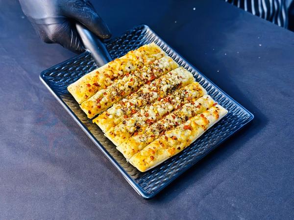 IN INDIAIN GUJARATIN AHMEDABADFrozen Baked Rolls: A Delicious, Hassle-Free Treat from Patidar BrothersLooking for a quick and delicious snack that’s easy to prepare and packed with flavor? Patidar Brothers’ frozen baked rolls are the perfect choice! Whether you need a savory treat for tea time, a light appetizer for guests, or a convenient on-the-go meal, our frozen baked rolls offer the ideal combination of crispiness, taste, and convenience.Why Choose Patidar Brothers’ Frozen Baked Rolls?Premium Ingredients: Made with high-quality dough, fresh fillings, and flavorful seasonings to deliver an irresistible taste.Healthier Alternative: Since they are baked instead of fried, our rolls offer a lighter option without compromising on flavor.Easy & Quick to Prepare: Simply bake in an oven or air fryer for a crispy and golden-brown finish in minutes.Variety of Fillings: Enjoy options like spiced vegetables, paneer, cheese, and even fusion flavors to suit every palate.Perfect for Every Occasion: Whether it’s a family snack, a party appetizer, or a lunchbox treat, our baked rolls are always a hit.How to Prepare Frozen Baked RollsPreheat the Oven: Set it to 375°F (190°C) for optimal crispiness.Place on a Baking Tray: Arrange the frozen rolls evenly on a baking sheet.Bake for 12-15 Minutes: Until golden brown and crispy.Serve & Enjoy: Pair with your favorite dips, chutneys, or sauces for an extra burst of flavor.Grab Your Pack Today!Skip the hassle of making rolls from scratch and enjoy a delicious, homemade-style snack with Patidar Brothers’ frozen baked rolls. Visit our store today and experience the perfect blend of taste and convenience!