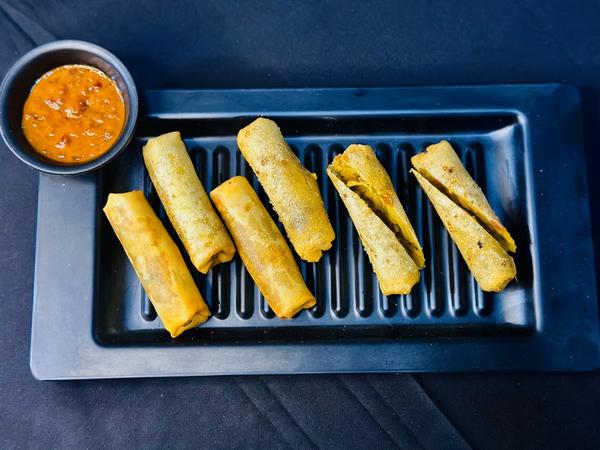 IN INDIA
IN GUJARAT
IN AHMEDABAD

Frozen Spring Rolls: Crispy, Delicious, and Ready in Minutes at Patidar Brothers

Looking for a quick and crispy snack that’s packed with flavor? Patidar Brothers’ frozen spring rolls are the perfect choice! Whether you need an appetizer for a party, a side dish for dinner, or a tasty evening snack, our frozen spring rolls deliver the perfect crunch with every bite.

Why Choose Patidar Brothers’ Frozen Spring Rolls?

Premium Ingredients: Made with fresh vegetables, authentic spices, and a light, crispy wrapper.

Quick & Easy to Prepare: Enjoy golden, crispy spring rolls in minutes.

Variety of Flavors: Choose from classic vegetable, paneer, or fusion-style fillings to satisfy every craving.

Crispy & Flavorful: Perfectly seasoned and wrapped for a satisfying crunch.

Great for Any Occasion: Ideal for parties, snacks, lunchboxes, or as a side dish.

How to Prepare Frozen Spring Rolls

Deep Fry: Heat oil to 350°F (175°C) and fry until golden brown.

Air Fry: Preheat to 375°F (190°C) and air-fry for 10-12 minutes, flipping halfway.

Bake: Preheat oven to 375°F (190°C) and bake for 15-18 minutes until crisp.

Serve & Enjoy: Pair with sweet chili sauce, soy sauce, or your favorite dip.

Get Your Frozen Spring Rolls Today!

Stock up on Patidar Brothers’ frozen spring rolls for a quick, crispy, and delicious treat anytime. Visit our store today and bring home the perfect snack!

