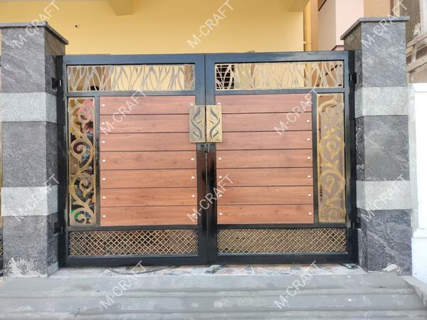 M-CRAFT ( Avadi, Chennai, Tamil Nadu)HPL Openable Main Gate and Wicket Gate with Laser Design and Hot Dip Galvanization (G.I) material with MRF PU Paint finishing.One of the best quality and price in chennai, Tamil Nadu.