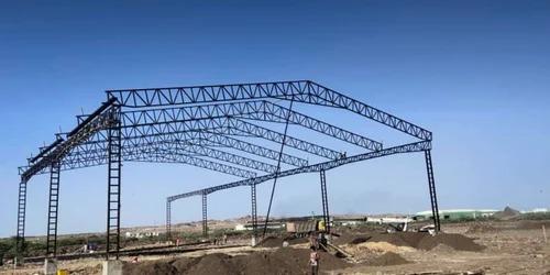 A COIL Steel Fabrication Shed is typically a large industrial building or workshop designed for the fabrication, assembly, and processing of steel coils into various products. These sheds are specifically engineered to accommodate heavy machinery, equipment, and raw materials used in the steel fabrication process