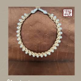 Dried yellow grass braided in patterns to procreate beautiful neck-pieces are traditional folk jewelries made by a number of families (which is steadily decreasing) living in and around interior West Bengal. Ornaments have a special position in tribal art space. Armed with indigenous, easily accessible materials tribal women weave and make nifty earrings and pretty chokers which are great for quotidian purposes. This attractive sikki jewelry this neck necklace is handcrafted out of the finest quality sikki grass.It is a neck necklace adjustable free size and made of three layers two layers are golden color and another line which is in between is black Brown color.This grass works because it is fine and beautiful and strong and durable Some grass and some thread are needed to make this neck necklace, grass and thread are provided These grasses are found especially on river sides, they are brought and then they are dried and used for various purposes . This attractive sikki jewelry this neck necklace is handcrafted out of the finest quality sikki grass.This grass works because it is fine and beautiful and strong and durable Some grass and some thread are needed to make this neck necklace, grass and thread are provided . These grasses are found especially on river sides, they are brought and then they are dried and used for various purposes These grasses are found especially on river sides, they are brought and then they are dried and used for various purposes Sikki grass crafts are various handicrafts that are made from a special kind of grass known as sikki found in West Bengal and Birbhum, India. Sikki is dried and the flower head is cut off. The resulting fine golden fibre is used in weaving to make toys, dolls, and baskets. Items are sometimes painted.