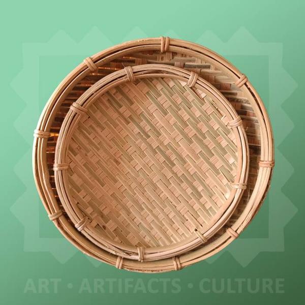 The Indian state of Meghalaya is rich in bamboo and cane resources and boasts a history of using these materials for construction and daily items. Cane and bamboo crafts occupy an important place in the local economy of the state, with artisans rendering items of daily use as well as fine-quality decorative pieces like this. Bamboo is the tallest grass existing in the world. It can fight with fungus and bacteria on its own. The tensile strength is much more than that of steel. Bamboo and cane crafts of Eastern India are environment friendly products which possess their individual features and style. They have successfully replaced the demand for wooden objects by producing various forms of utility and decorative artefacts. Basket weaving is an ancient art in India. Indigenous communities develop special shapes and patterns of baskets based on their local traditions, needs and techniques