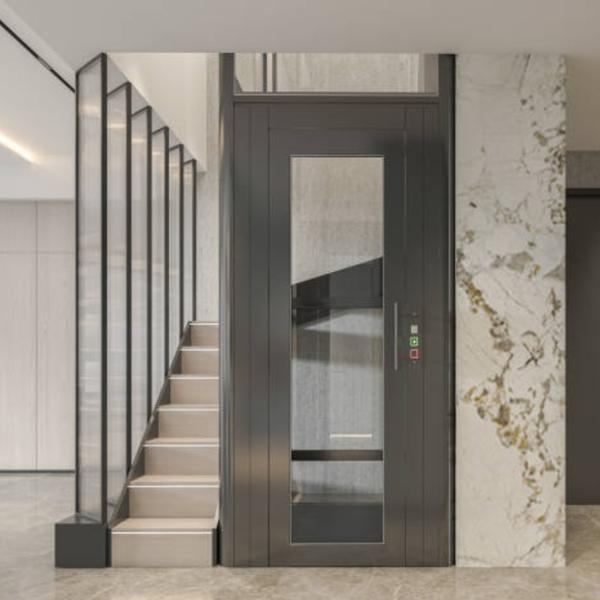 The Vini Residential Elevator is a perfect blend of luxury, convenience, and accessibility for modern homes, villas, duplexes, and bungalows. Designed to enhance mobility for seniors, children, and individuals with mobility challenges, this elevator offers a smooth, silent, and space-efficient solution for private residences. With customized interiors, smart technology, and energy-efficient performance, it adds comfort and sophistication to your home.Key Features: - Space-Saving Design – Compact structure with minimal civil modifications required - Smooth & Silent Performance – Gearless traction drive for a vibration-free ride - Energy-Efficient Motor – Low power consumption for eco-friendly operation - Custom Interiors & Finishes – Choice of luxury cabin designs, flooring, and lighting - Smart Home Integration – IoT-enabled control, smartphone connectivity, and voice activation - Advanced Safety Features – Emergency stop, battery backup, anti-slip flooring, and automatic rescue device - Low Maintenance & Long-Lasting – High durability with hassle-free servicingThe Residential Elevator by Vini Elevators is a premium home mobility solution, designed to provide style, safety, and superior comfort for modern living.
