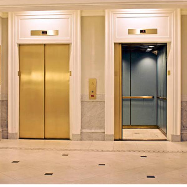 The Vini Hotel Elevator is a premium, high-performance vertical transportation solution designed for luxury hotels, resorts, and premium hospitality spaces. Built for style, speed, and comfort, this elevator enhances the guest experience with smooth, silent rides, elegant interiors, and cutting-edge smart technology. Whether in lobbies, suites, or rooftop areas, the Vini Hotel Elevator seamlessly blends luxury with efficiency.Key Features: - Elegant & Luxurious Cabin Designs – Custom interiors with glass, wood, or stainless steel finishes - Ultra-Smooth & Silent Operation – Gearless traction drive for a vibration-free experience - Smart Destination Control System – AI-based traffic management for reduced waiting time - Energy-Efficient & Eco-Friendly – Regenerative drive technology for power savings - Touchless & Biometric Access – Ensures premium security and hygiene for guests - Panoramic Glass Options – Stylish glass-walled cabins for scenic views in high-end hotels - Advanced Safety Features – Emergency auto-rescue, fire-rated materials, and overload protectionThe Hotel Elevator by Vini Elevators is designed to offer an unparalleled guest experience, combining luxury, efficiency, and advanced technology in world-class hospitality environments.