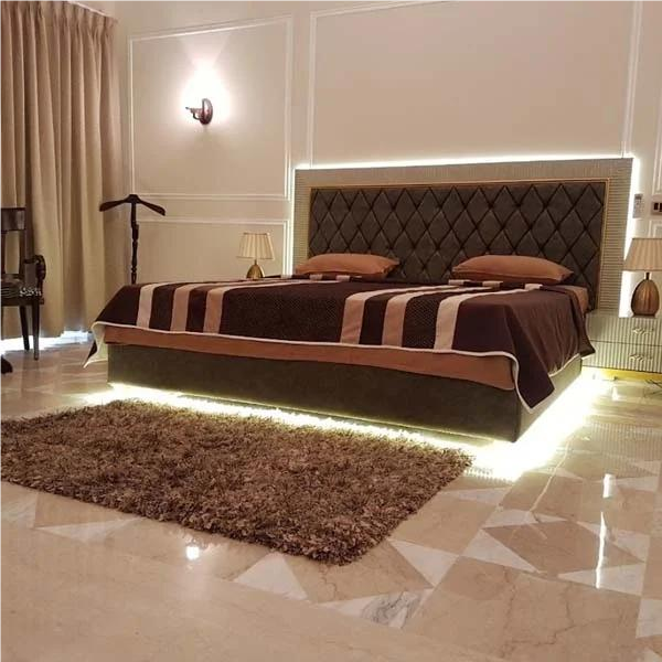 A Leading Teak Wood Interiors We Provide Affordable Cost And No Compromise in Quality In Works,Original Nilambur Teak Wood Only For All.Designing a full teak wood bedroom interior can create a luxurious, warm, and timeless aestheticColor PalettePrimary Colors: Use the natural golden-brown tones of teak wood as the foundation.Complementary Colors: Pair with neutral tones like beige, cream, or white to balance the richness of the wood.Accent Colors: Add depth with deep greens, navy blues, or burnt orange for upholstery, curtains, or decor.Furniture SelectionBed Frame: A solid teak wood bed frame with a sleek, modern design or intricate carvings for a traditional look.Wardrobe: Floor-to-ceiling teak wood wardrobes with minimalistic handles or mirrored panels.Nightstands: Matching teak wood nightstands with drawers for functionality.Dressing Table: A teak wood dressing table with a large mirror and storage for a cohesive look.Seating: Add a teak wood bench at the foot of the bed or a cozy armchair with teak wood frames.FlooringTeak Wood Flooring: Use teak wood planks for flooring to create a seamless, elegant look.Rugs: Layer with a neutral or textured rug to add warmth and contrast. Walls and CeilingWall Color: Opt for light, neutral wall colors (e.g., off-white, light gray) to let the teak wood stand out.Accent Wall: Consider a teak wood paneled accent wall behind the bed for a striking focal point.Ceiling: Use teak wood beams or paneling for a rustic or luxurious touch.LightingCeiling Lights: Choose warm, ambient lighting with teak wood-framed pendant lights or chandeliers.Bedside Lamps: Teak wood base lamps with fabric or metal shades.Natural Light: Use sheer curtains to allow natural light to enhance the wood's natural beauty.Textiles and UpholsteryBedding: Use high-quality linen or cotton bedding in neutral tones or subtle patterns.Curtains: Opt for lightweight fabrics like linen or silk in beige, cream, or soft gray.Cushions and Throws: Add texture with woven or embroidered cushions and throws in complementary colors.Decor and AccessoriesMirrors: Teak wood-framed mirrors to enhance the sense of space.Artwork: Choose artwork with earthy tones or abstract designs to complement the teak wood.Plants: Add greenery like potted plants or succulents to bring life to the space.Decorative Items: Use teak wood trays, bowls, or sculptures for a cohesive look. Storage SolutionsBuilt-in Shelving: Teak wood shelves for books, decor, or personal items.Cabinets: Teak wood cabinets with glass doors to display decorative pieces.Style VariationsModern: Clean lines, minimalistic teak wood furniture, and neutral tones.Traditional: Ornate carvings, rich fabrics, and vintage teak wood pieces.Rustic: Distressed teak wood, natural textures, and earthy colors.Scandinavian: Light teak wood finishes, white walls, and functional design.Maintenance TipsRegularly dust and clean teak wood furniture with a soft cloth.Use teak oil to maintain the wood's natural luster and prevent drying.Avoid direct sunlight to prevent fading.