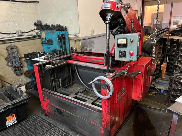 ### **Cylinder Line Boring and Honing**  **Line boring and honing** are precision machining processes used to ensure proper alignment of the main bearing bores in the engine block. This is crucial for maintaining the integrity of the crankshaft and ensuring smooth engine operation.  ---## **1. Cylinder Line Boring**  Line boring is performed when the main bearing bores are **out of alignment**, worn, or distorted due to stress, overheating, or improper assembly.  ### **Steps for Line Boring:**  🔧 **Inspection & Measurement:**  - Use a **dial bore gauge** or **micrometer** to check the bore diameter and alignment.  - Inspect for wear, ovality, or misalignment in the main bearing bores.  🔧 **Machining Process:**  - Secure the engine block onto a **line boring machine**.  - Align the boring tool precisely to the centerline of the crankshaft.  - Bore each main bearing journal to the correct size in multiple passes.  🔧 **Final Check:**  - Measure the final bore diameter to ensure consistency.  - If necessary, install **oversized main bearing shells** to restore the correct clearance.  ---## **2. Cylinder Line Honing**  After boring, line honing is performed to achieve **a smooth and perfectly aligned surface** for the crankshaft bearings.  ### **Steps for Line Honing:**  🛠 **Tool Setup:**  - Install **honing mandrels** into the main bearing bores.  - Use fine abrasives to remove minor imperfections and refine bore size.  🛠 **Honing Process:**  - Apply **honing oil** to reduce friction and heat.  - Move the honing tool evenly to maintain a straight and round bore.  - Check for a consistent surface finish and correct bore size.  🛠 **Final Inspection:**  - Measure the final bore diameter and alignment with a **bore gauge**.  - Ensure correct oil clearance for the crankshaft bearings.  ---### **Why Line Boring and Honing Matter?**  ✅ Ensures **crankshaft alignment**, reducing vibration and wear.  ✅ Restores **bearing bore roundness**, improving engine efficiency.  ✅ Helps prevent premature **bearing failure and oil pressure issues**.  Would you like guidance on recommended tools or troubleshooting misalignment issues? 🔧