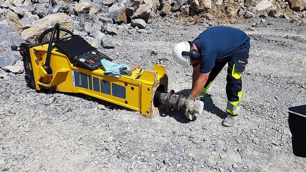 ### **Hydraulic Rock Breaker Repair Service**  Hydraulic rock breakers are essential for heavy-duty excavation, mining, and demolition tasks. Over time, they undergo wear and tear due to continuous impact and extreme working conditions. A proper repair service ensures their efficiency, prolongs lifespan, and minimizes downtime.  ---## **1. Common Issues in Hydraulic Rock Breakers**  - **Low Impact Power** – Caused by worn-out piston seals, damaged diaphragms, or low nitrogen pressure.  - **Oil Leakage** – Due to faulty seals, cracked hoses, or damaged fittings.  - **Excessive Vibration & Noise** – Resulting from loose bolts, misalignment, or worn bushings.  - **Hammer Not Firing** – Often due to clogged filters, faulty control valves, or piston damage.  - **Chisel Stuck or Worn Out** – Caused by improper lubrication or extensive use without replacement.  ---## **2. Hydraulic Rock Breaker Repair Process**  ### **Step 1: Inspection & Diagnosis**  - Visual examination of external wear and damage.  - Pressure testing of hydraulic circuits.  - Disassembly to inspect pistons, seals, and bushings.  ### **Step 2: Component Repair & Replacement**  - **Seal & Bushing Replacement** – Worn-out seals and bushings are replaced to prevent oil leaks and ensure smooth movement.  - **Nitrogen Recharge** – Replenishing nitrogen gas in the accumulator for consistent impact power.  - **Hydraulic Hose & Valve Check** – Ensuring proper fluid flow and replacing faulty hoses or valves.  - **Chisel & Tool Repair** – Regrinding or replacing the chisel if heavily worn.  ### **Step 3: Reassembly & Testing**  - Proper alignment of all components.  - Lubrication of internal parts for smooth operation.  - Load and impact testing to verify functionality.  ---## **3. Preventive Maintenance Services**  - Regular inspection of seals, bushings, and chisel condition.  - Hydraulic oil analysis and filter changes.  - Periodic nitrogen pressure checks to maintain impact efficiency.  - Bolt tightening and lubrication schedule adherence.  ---## **4. Benefits of Professional Repair Service**  ✅ **Cost Savings** – Repairing is more economical than purchasing a new breaker.  ✅ **Reduced Downtime** – Quick turnaround times minimize equipment downtime.  ✅ **Extended Equipment Life** – Regular maintenance prevents major failures.  ✅ **Improved Efficiency** – Proper servicing ensures consistent impact force and performance.  Would you like a customized maintenance schedule or recommendations for specific brands like Atlas Copco, Montabert, or JCB?