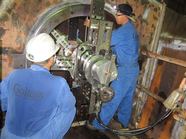 **In Situ Line Boring** is a machining process used to repair or restore the alignment and diameter of worn or damaged holes on large, heavy-duty equipment, particularly when disassembling and transporting the parts is impractical. This method is commonly employed in the repair of industrial machinery like excavators, cranes, mining equipment, and large engines, where the equipment is too large or immobile to be taken to a traditional machine shop.In situ line boring allows for the repair of holes in their original positions, without removing the components or parts, offering a fast and cost-effective solution to extend the lifespan of machinery.### **Key Components of In Situ Line Boring:**1. **Boring Bar**: The central tool used for line boring, which is adjustable and customizable to fit the size and shape of the hole to be repaired. It allows for precise machining of the hole's alignment and diameter.2. **Guides and Support Systems**: In situ line boring requires specialized equipment to support the boring bar and keep it aligned correctly within the worn hole. These guides are positioned around the damaged hole to maintain accuracy during the boring process.3. **Machining Tools**: Various cutting tools are used on the boring bar, including rotary cutting tools, to precisely remove material from the hole and restore it to the correct specifications.4. **Portable Milling Equipment**: This is used in the in situ process for tasks like facing and smoothing the surfaces of the bore, ensuring the hole is ready for reassembly with the new or repaired parts.---### **Steps Involved in In Situ Line Boring:**1. **Inspection and Measurement**:   - The first step is to inspect and assess the wear or damage to the hole. This involves using precision measuring tools (such as bore gauges or lasers) to determine the alignment, diameter, and depth of the worn-out hole.   - A full assessment helps decide whether line boring is the best solution or if other methods, such as welding or reaming, might be more appropriate.2. **Preparation of the Work Area**:   - The area around the worn hole is thoroughly cleaned to remove any debris, rust, or contaminants that could interfere with the process.   - Any parts or components that could obstruct the repair are temporarily removed or shielded.3. **Setting Up the Line Boring Equipment**:   - The in situ line boring machine, including the boring bar and support system, is carefully set up around the worn hole. The machine is aligned to ensure the boring bar stays perfectly level and centered throughout the operation.   - The boring bar is adjusted to the correct size based on the measurements taken earlier.4. **Machining the Hole**:   - The boring process begins by rotating the cutting tool attached to the boring bar inside the hole. The worn hole is gradually expanded to the correct diameter and aligned to its original position. The machine operator will take multiple passes to achieve the desired precision and alignment.   - Precision cutting ensures that the hole’s surface is smooth, and the bore is concentric, ensuring that parts can be properly reassembled.5. **Measuring and Final Adjustments**:   - After each pass, measurements are taken to verify the accuracy of the work. If the hole is not yet to the correct specifications, additional cutting is performed. Final measurements ensure that the hole is now within the required tolerances.6. **Finishing the Surface**:   - In addition to adjusting the diameter and alignment, the bore's surface is finished to ensure smoothness. If necessary, milling or honing tools are used to improve the surface finish, ensuring that new bushings, pins, or sleeves fit correctly.7. **Reassembly**:   - After the hole is bored and finished, any components or parts that were removed during the process are reinstalled.   - New parts such as bushings, bearings, or sleeves may be inserted to restore the machine to full functionality.8. **Testing and Quality Control**:   - The machine is tested to ensure that the bore is now properly aligned and functional. Any necessary adjustments are made before the equipment is returned to service.   - Additional inspections ensure that there are no further issues with alignment or fit.---### **Advantages of In Situ Line Boring:**1. **Cost-Effective**:   - **No Need for Dismantling**: In situ line boring saves on the cost of disassembling large equipment, transporting parts to a machine shop, and reassembling the machinery afterward. The work is done on-site, reducing downtime and logistical costs.   - **Faster Turnaround**: Since the repairs are done directly on the equipment, turnaround times are faster compared to traditional methods.2. **Minimal Equipment Downtime**:   - In situ line boring significantly reduces downtime because the machinery does not need to be removed from its operating location for repairs.3. **Precision and Accuracy**:   - The process ensures high precision and accurate alignment, ensuring the bore is restored to exact specifications and the components fit perfectly.4. **Restoration of Structural Integrity**:   - Line boring can restore worn holes to their original dimensions, preserving the structural integrity of the machine, particularly for components like booms, buckets, and housings.5. **Environmentally Friendly**:   - It reduces the need for replacing large parts or entire assemblies, minimizing material waste and the environmental impact of manufacturing new components.---### **Common Applications of In Situ Line Boring:**1. **Mining Equipment**:   - Excavators, draglines, and bulldozers in mining operations often suffer from worn-out pivot points, bushings, and other components that require line boring to restore their functionality.2. **Construction Machinery**:   - Cranes, backhoes, and other construction equipment that experience wear on boom arms, bucket pins, and other high-stress points often require in situ line boring to maintain their efficiency.3. **Marine and Offshore Equipment**:   - Large marine equipment, such as ship cranes or offshore oil drilling rigs, may require in situ line boring due to the large size of components and the impracticality of moving parts.4. **Agricultural Equipment**:   - Tractors, harvesters, and other agricultural machines with worn pivot points or axle assemblies often benefit from in situ line boring to restore their performance.5. **Industrial Manufacturing Equipment**:   - In large factories or plants where heavy machinery operates continuously, the need for line boring can arise in machinery such as presses, conveyors, or forklifts, especially on high-stress components like gearboxes or pins.---### **Challenges of In Situ Line Boring:**1. **Precision and Skill**:    - Performing line boring requires a highly skilled operator to ensure that the boring bar stays properly aligned, as any misalignment can result in the machine operating inefficiently or damaging other parts.2. **Limitations on Size**:   - While line boring is ideal for medium to large-scale equipment, there are size limits to the components that can be handled effectively on-site. Extremely large machines may require custom solutions or additional equipment.3. **Tool Wear**:    - The harsh operating conditions can cause rapid tool wear, especially when working with hardened steel or heavily worn parts. Regular maintenance of the boring equipment is essential for high-quality results.---### **Conclusion:**In situ line boring is a highly efficient and cost-effective method for restoring the alignment and diameter of damaged or worn holes in large machinery. By allowing repairs to be made on-site without removing heavy equipment, this solution minimizes downtime and maximizes operational efficiency, making it a vital process for industries such as mining, construction, agriculture, and manufacturing.