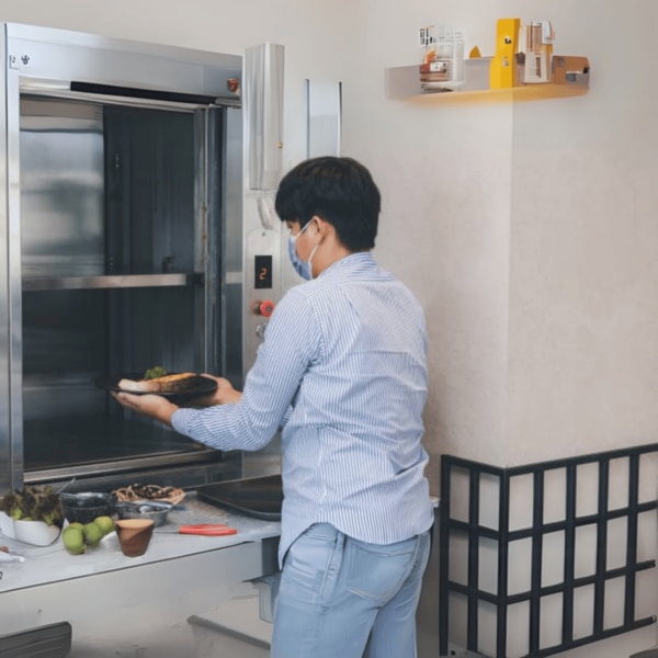 The Dumbwaiter Elevator by Vini Elevators is a compact and efficient lift designed for transporting small goods, food, and utensils between different floors in restaurants, hotels, and hospitals. This lift reduces manual handling efforts, enhances operational efficiency, and ensures quick and hygienic service. Built with stainless steel cabins and automatic doors, the dumbwaiter is easy to maintain and integrates seamlessly into modern kitchens and service areas. Its smooth and silent operation makes it a perfect addition to any establishment that requires fast and reliable transportation of lightweight materials.