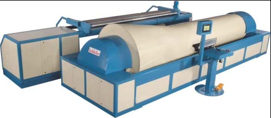 Sectional Warping MachineSpecial Features of the Advanced Computerized Sectional Warping Machine:Auto Advance Warp Table:The Advanced Computerized Sectional Warping Machine is engineered for precision with an auto-advancing warp table. Crossing and warping combs are optimally aligned to ensure the yarn travels in a straight path from the creel to the drum, minimizing angles and bends. The warping comb is positioned close to the drum for exact control over section width. As yarn builds up on the drum, the comb adjusts automatically, maintaining a consistent distance throughout the process. Upon section completion, the machine resets to its home position with an accuracy of 0.1 mm, ready for the next section.Touch Screen Display:This Sectional Warping Machine features a user-friendly color touchscreen interface. A visible signal tower alerts operators of drum stoppages due to thread breaks, completed lengths, or system errors including software, hardware, or electrical issues.Disc Brakes:A specially designed hydraulic disc brake system delivers precise and immediate stopping. It absorbs any brake drum irregularities, ensuring consistent yarn tension during the beaming process — a key aspect of the Advanced Computerized Sectional Warping Machine.Beam Tension Control:Developed by 'Bobbiler', this tension control system helps create perfect weaver beams for maximum loom efficiency. Separate pressure relief valves for warping and beaming allow manual tension adjustment of the yarn sheet as needed.Leasing Device:The leasing system on this Sectional Warping Machine prevents yarn entanglement. Yarn layers pass through the crossing and guide combs in an open state directly to the drum. The wide crossover area simplifies cord placement, and vertical comb movement ensures smooth crossover formation.Beaming Device:The Advanced Computerized Sectional Warping Machine includes a durable beaming unit capable of handling heavy warp beams. Dual support drives ensure synchronized starting, while individual or linked movement allows precise beam alignment. Beaming speed is adjustable up to 100 m/min.Salient Features of the Sectional Warping Machine:Solid, dynamically balanced metallic drum with fixed cone height.Heavy-duty separate frames for warping and beaming functions.Motorized beaming unit for efficient positioning.Variable AC frequency drive with full servo and PLC control.Precision servo control for warp table traverse, cross motion, and headstock synchronization.Accurate warp length measurement with lost end memory.Auto section advancement for improved efficiency.Steady warping and beaming speeds throughout the process.Intuitive operational panel with full-color touch display for monitoring and control.High-performance hydraulic disc brakes on both sides with power-failure safety.Hydraulic doffing and donning system for beam handling.