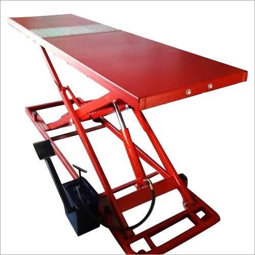 A two-wheeler ramp is a device used to lift motorcycles and scooters off the ground, making it easier for mechanics to access and work on various parts of the vehicle. These ramps come in different types, including hydraulic, manual, and automatic, each with its own advantages and disadvantages. They are commonly used in auto garages and workshops for maintenance and repair tasks. Types of Two-Wheeler Ramps:Hydraulic Ramps:These ramps use hydraulic systems to lift the vehicle smoothly and efficiently. They are often preferred for their ease of operation and ability to handle various vehicle models. Manual Ramps:These ramps require manual effort to lift the vehicle, typically using a lever or foot pedal. They are generally more affordable and require less maintenance. Automatic Ramps:These ramps use electric or pneumatic power to lift the vehicle, often with automatic safety features. They offer convenience and ease of operation but may come at a higher cost. Features and Benefits:Ease of Access:Ramps allow mechanics to easily access undercarriage components, such as the engine, suspension, and exhaust system. Safety:They provide a stable and secure platform for working on the vehicle, reducing the risk of accidents. Efficiency:Ramps streamline maintenance and repair processes, saving time and labor. Durability:Many ramps are constructed from durable materials like steel and aluminum, ensuring long-term use. Customization:Some ramps are adjustable in height, and some may have features like a platform for added stability. Common Applications:Auto Garages:Ramps are essential tools in auto garages for routine maintenance, repairs, and inspections. Motorcycle Shops:They are frequently used in motorcycle shops for a variety of tasks, including oil changes, tire repairs, and brake servicing. DIY Enthusiasts:Some individuals use ramps to perform DIY repairs on their motorcycles and scooters. 