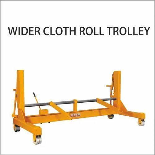 Wider Cloth Roll TrolleyWider Cloth Roll Trolley by BobbilerEffortless Handling. Maximum Efficiency.The Wider Cloth Roll Trolley, manufactured by Bobbiler, is expertly designed to provide seamless transportation and storage of large and heavy cloth rolls within textile units, garment factories, and industrial production floors. Built for strength and stability, this trolley ensures smooth maneuverability and protects delicate fabrics during transit.Key Features:Sturdy Construction: Fabricated using high-grade materials for durability and long-lasting performance under heavy workloads.Spacious Design: Extra-wide frame accommodates oversized cloth rolls with ease, ideal for bulk material handling.Smooth Mobility: Equipped with heavy-duty castor wheels for effortless movement, even in tight spaces.Ergonomic Design: Easy-to-grip handles and optimal height for user comfort and efficient handling.Corrosion Resistant Finish: Powder-coated or stainless-steel finish ensures resistance against rust and wear.Applications:Perfect for use in textile mills, garment manufacturing units, fabric dyeing plants, and warehouses.Choose Bobbiler’s Wider Cloth Roll Trolley for reliable performance, enhanced workflow, and safe material handling every time.