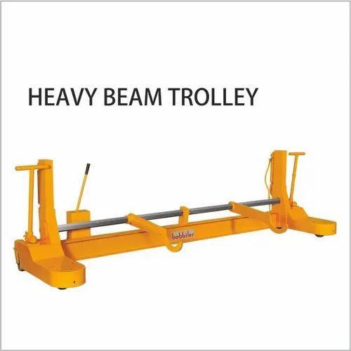 Heavy Beam TrolleyHeavy Beam Trolley – Precision Engineered for Heavy-Duty PerformanceManufacturer: BobbilerBobbiler’s Heavy Beam Trolley is designed to deliver unmatched strength, durability, and smooth mobility for handling heavy loads with ease. Built using high-grade materials and cutting-edge manufacturing techniques, this trolley is ideal for industrial applications involving the transportation of heavy beams, girders, and structural components.Key Features:Robust Construction: Made from premium quality steel to ensure superior load-bearing capacity and long operational life.High Load Capacity: Engineered to handle heavy-duty loads with precision, suitable for a wide range of industrial environments.Smooth Mobility: Equipped with heavy-duty wheels and precision bearings for effortless movement along I-beams or H-beams.Adjustable Width: Versatile design allows easy adjustment to fit various beam sizes.Corrosion Resistant: Coated with industrial-grade paint or powder coating to withstand harsh working conditions and extend lifespan.Easy Installation: Designed for quick and hassle-free mounting and operation.Applications:Steel fabrication unitsConstruction sitesWarehousing and logisticsHeavy machinery workshopsShipyards and portsBobbiler’s commitment to quality and innovation ensures that every Heavy Beam Trolley meets stringent performance and safety standards. Whether you’re lifting, shifting, or suspending heavy components, trust Bobbiler for equipment that delivers reliability you can count on.