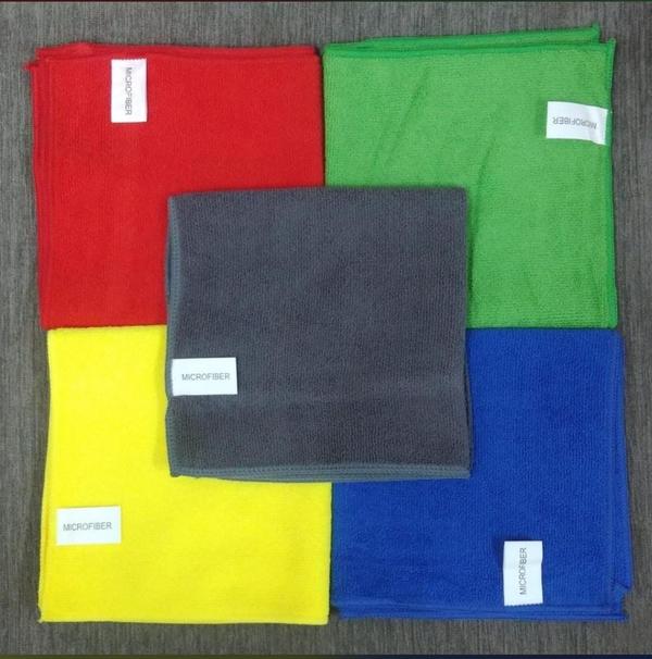 A **600 GSM microfiber cloth** is an ultra-thick, high-quality cleaning tool made from densely woven synthetic fibers.
