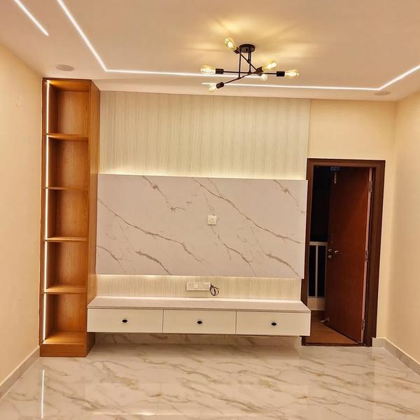 Upgrade your entertainment experience with stunning custom TV unit designs by Minion Smart Home Solutions – your trusted choice for TV unit interiors in Chennai and across India. We specialize in designing modern, space-saving, wall-mounted, and floor-standing TV units that add both style and functionality to your living room or entertainment space.Our team of experts creates TV units that perfectly fit your room layout, blending woodwork, lighting, storage, and even smart automation. From minimalist floating shelves to luxury panel designs, every detail is customized to enhance your home’s overall interior.We proudly serve locations across Chennai like T. Nagar, Velachery, Anna Nagar, Tambaram, and OMR, and offer our design services in Tamil Nadu cities such as Coimbatore, Madurai, Salem, Erode, and Trichy. Our TV unit solutions are also popular in metro cities like Mumbai, Bangalore, Pune, Delhi, Hyderabad, and many more across India.✔️ Wall-mounted and floor-standing TV units✔️ Storage-integrated, sleek modern designs✔️ Smart automation and lighting options✔️ Tailored to match your existing interiors📍 Visit smarthomeindia.in or call 9655006409 for a free design consultation. At Minion Smart Home Solutions, we design TV units that bring both elegance and innovation to your home.