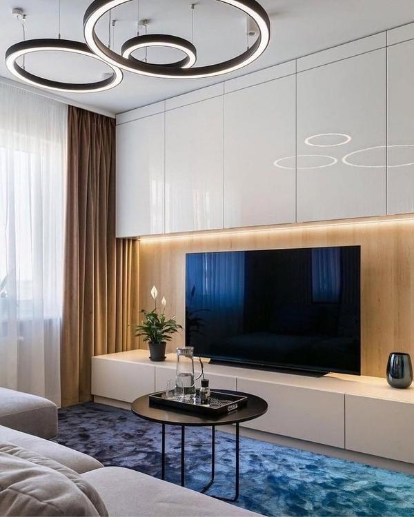 Transform your living room into a stylish and functional space with custom TV unit designs from Minion Smart Home Solutions. Our expert designers specialize in modern TV wall units that perfectly blend with your home decor while offering smart features like storage solutions, concealed wiring, and smart lighting integration. Whether you need a floating TV unit, a full-length media panel, or a compact entertainment solution, we create pieces that suit all spaces and preferences.Our TV units are crafted with premium materials and designed to maximize space while enhancing your viewing experience. Whether you're looking for a sleek, minimalist design or a classic wood finish, our team works with you to create the perfect unit for your home.We serve key locations in Chennai like Velachery, Anna Nagar, T. Nagar, Tambaram, and OMR, and also extend our expert services to cities across Tamil Nadu, including Madurai, Coimbatore, Salem, Trichy, and Erode. We are also proud to serve metro cities across India, including Bangalore, Mumbai, Delhi, Pune, and Hyderabad.✔️ Fully customized TV unit solutions✔️ Wall-mounted, floating, and traditional designs✔️ Smart TV units with integrated lighting and storage✔️ Perfect for apartments, villas, and modern homes📍 Explore our designs at smarthomeindia.in or call 9655006409 for a free consultation. At Minion Smart Home Solutions, we specialize in creating TV units that fit your space, style, and needs.