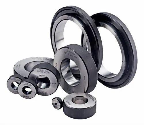 RING GAUGES AND MASTER SETTING RINGSWe manufacture Ring Gauges in GO-NOGO Pairs as well as single mastersetting rings to specified nominal sizes.>>MATERIAL•Steel dia: 1mm to 450mm•Carbide dia: 2mm to 60mm>>FEATURES•Made from AISI001 Special tool steel (OHNS With Tungsten) and submicron Tungsten Carbide.•Stabilised and sub-zero treated (-80deg C) for better dimension retention and wear resistance.•Calibrated on CarlZzeiss/ Octagon-Heidenhain Universal length measuring machine (NABL).•Actual dimension are laser marked on master setting rings.