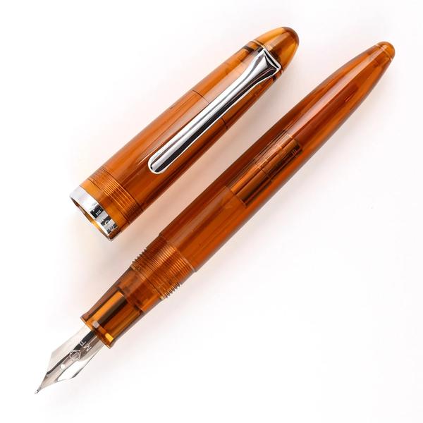 Sailor Profit Junior Fountain Pen - Transparent Light Brown CT The Sailor Profit Junior Transparent Fountain Pen is a limited edition pen. The Sailor Profit Junior is an interesting entry-level fountain pen with high-quality. It's confortable and well belanced and has a traditional cigar shape desing. Sailor Profit Junior Transparent Fountain pens come with a transparent body with nickel chrome plating finish and clear feed. The pen comes with a Medium Fine stainless steel nib. Sailor Pen Company is a well-known Japanese manufacturer of high-quality writing instruments, particularly fountain pens. The company was founded in 1911 by Kyugoro Sakata in Hiroshima, Japan. The company aimed to produce high-quality writing instruments to rival Western products. Sailor is famous for its nibs, many of which are handcrafted by skilled artisans. The company offers a wide range of nib sizes and styles, including specialized nibs like the Naginata Togi. Sailor Pen Company is a distinguished name in the world of fountain pens, celebrated for its dedication to quality, craftsmanship, and innovation. Made from cigar-shaped Transparent resin body Stainless steel Nib Available in Medium Fine Screw-cap with chrome plated trim Fountain pen with Cartridge / Converter filling system Fountain pen is presented in a beautiful Sailor gift box. Body Material: Resin Nib Material: Steel Brand Origin: Japan Series: Sailor Profit Junior Fountain Pen Transparent Light Brown Type: Fountain Pen Find all your art supply needs in one place! THE ART CITY IN GOREGAON WEST SHOP NO .7 SNEHDEEP CHS . VIDHAYANIKETAN MARG ROAD NO 17, M.G.ROAD GOREGAON WEST - 400 104. website - theartcity.net People also buy from.. THE ART CITY IN GOREGAON MUMBAI CONTECT - 9029548319 - 8169633825 FOUNTAIN PEN | ROLLER PEN | ROLLER BALL PEN | FINE TIP PEN | GEL PEN | CLICK PEN | MULTI INK PEN | CALLIGRAPHY PEN | REFILLABLE INK PEN | BRUSH PEN | CROSS | WATERMAN | SHEAFFER | LAMY | PARKER | PELIKAN | PILOT | SAILOR |