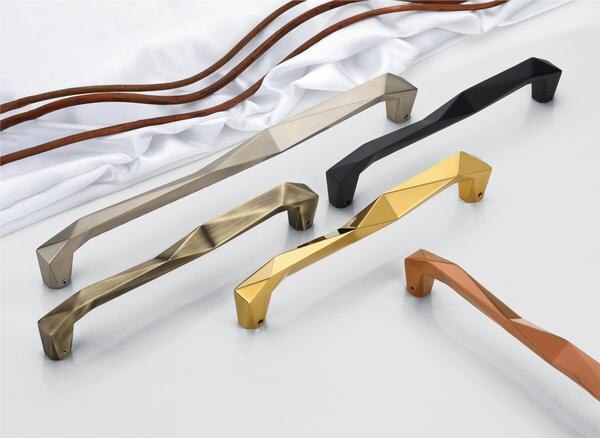 Unleash the bold with these faceted masterpiece handles—designed to stand out with geometric elegance and sculptural finesse. Each handle in this collection boasts a chiseled, edgy profile, perfect for those who appreciate modern design with a touch of architectural flair.Crafted in an array of rich finishes—from matte black to antique brass, gold, and rose gold—these handles make a luxurious statement on any main door. The sharp angles not only bring a distinctive aesthetic but also ensure a firm, ergonomic grip.Made with premium PVD coating, they’re built to last with scratch resistance and a 3-year guarantee, ensuring they remain as stunning as the day they were installed. For homes that dare to be different, this collection is the perfect blend of strength, style, and sophistication.