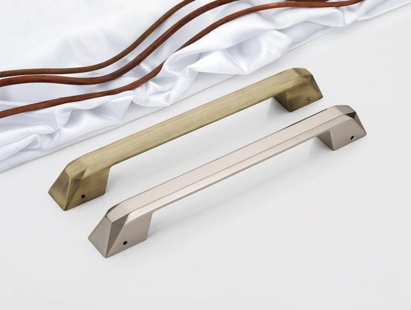 Introducing a bold fusion of innovation and artistry—this designer main door handle series redefines contemporary elegance. With its sculpted form and intricately carved detailing at the ends, each handle is a showcase of refined engineering and aesthetic precision.The streamlined body gradually tapers, creating a sleek, aerodynamic silhouette, while the cut-out accents add dimension and depth. Topped with contrasting metal caps, the handles make a striking visual impact, available in rich tones like matte black, copper, and rose gold.Engineered with a durable PVD finish and backed by a 3-year warranty, these handles bring a modern, luxurious edge to any entrance, turning a functional piece into a true design feature.