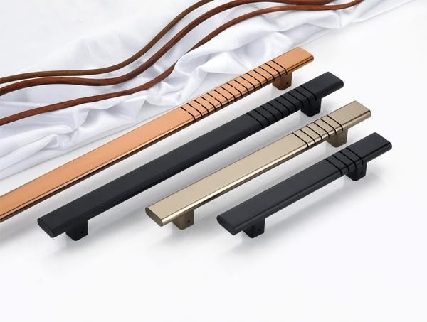 Command attention and redefine minimalism with this modern series of linear precision door handles, where sleek geometry meets artistic intent.Every handle in this collection is a masterstroke of balance—long, uninterrupted surfaces contrast sharply with a rhythmic arrangement of etched grooves that not only add grip but radiate industrial sophistication. These aren’t mere design details; they are architectural punctuation marks that emphasize clarity and purpose.Finished in a palette of refined metallics and rich matte tones, this range offers:Warm rose gold for an opulent, fashion-forward vibeBrushed champagne that whispers understated luxuryJet black and graphite for a bold, contemporary presenceThe elongated form gives a striking silhouette, while the squared profile enhances the grip, ensuring that the user feels the quality in every interaction. With PVD-coated durability and 3-year guaranteed resilience, these handles don’t just perform—they elevate.Perfect for interiors that champion refined simplicity and bold statements, these handles are designed for those who see beauty in sharp lines and intelligent design.