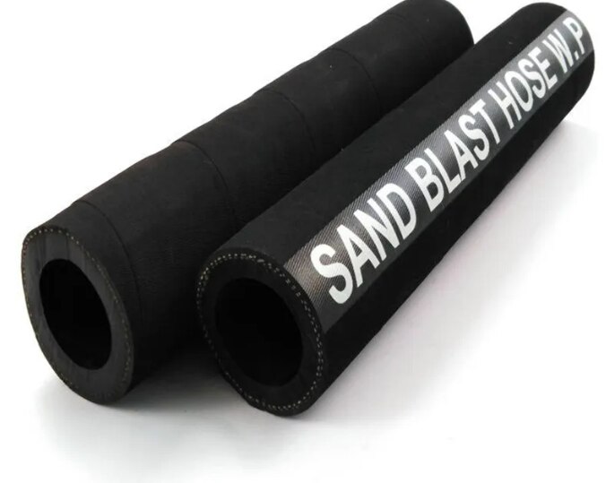 TUBE: Specially compounded abrasion resistant natural rubber, high resilienceREINFORCEMENT: High tensile synthetic plies with copper wireCOVER: Black abrasion resistant natural rubber cover. Wrap Finish.TEMP RANGE: -40°C to +70°C Approx.APPLICATIONS: For shot and sand blasting applications that help in clearing metal surtaces, etching glass or smoothing casting.PROPERTIES: High Abrasion Resistance Uniform Thickness Flexible APPLICABLESTANDARDS: IS 5894STANDARD COLOUR: Inner Tube Black , Outer Cover- Black