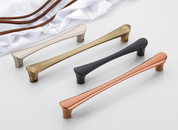 Introducing a new era of understated luxury—this collection of door handles is where minimalist elegance meets sculptural grace. Each handle in this series is a refined expression of balance and flow, designed to complement modern interiors that speak in soft tones yet leave a bold impression.With a silhouette that gradually tapers from base to tip, these handles mimic the subtle curves found in nature, offering a seamless, fluid design that feels as effortless as it looks. The ergonomic form enhances both grip and style, while the slightly flared base anchors the design in stability and strength.Available in a carefully curated selection of finishes, this collection includes:•	Pearl matte for a soft, sophisticated glow•	Vintage brass with warm brushed texture for timeless charm•	Jet black for a bold, contemporary statement•	Rose gold mirror for a high-gloss, fashion-forward impactEach handle is crafted with PVD coating for superior resistance to corrosion, fading, and scratches—ensuring beauty and performance that lasts. Backed by a 3-year guarantee, these handles are not only an aesthetic upgrade but a long-term investment in quality.Ideal for those who desire sleek, sculptural hardware with a luxurious edge, these handles redefine what it means to be simple yet stunning—where form doesn’t just follow function, it elevates it.