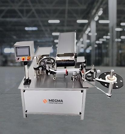 An Automatic Rotary Sticker Labeling Machine by Megma International is ahigh-speed, precision labeling system designed to apply self-adhesive labels onto round, square, oval or uniquely shaped bottles and containers with extreme accuracy. This machine is widely used in industries such as pharmaceuticals, food & beverages, cosmetics, chemicals, and consumer goods,where high-speed labeling with consistent placement is essential. The machine operates using a rotary indexing system, where containers are securely held in a rotary turret and rotated through multiple labeling stations. Servo-driven label applicators and advanced sensors ensure precise label placement, reducing errors and minimizing waste. This system allows for wrap-around, front & back, and security/tamper-evident labeling,depending on product requirements.  The Automatic Rotary Sticker Labeling Machine has a PLC-based touchscreen control panel, high-speed performance, and easy-to-use settings for a variety of container sizes and shapes. It supports various label materials such as paper, plastic, transparent and holographic labels. This machine is ideal for high-volume production lines,ensuring efficiency, accuracy, and reliability. 