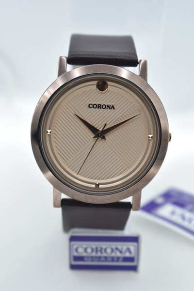 Introducing our Brown Plated Men's Wrist Watch, a harmonious blend of rugged elegance and modern style. The brown-plated case perfectly pairs with a rich leather strap, creating a striking combination. Elevate your appearance with this exceptional timepiece, where classic tones meet contemporary design, resulting in a statement of versatile masculinity.
