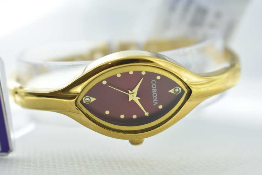 Presenting our Gold Plated Women's Wrist Watch, where elegance meets precision. The gold-plated case embraces a charming pink dial, driven by Japanese movement for impeccable accuracy. Elevate your wrist with this enchanting timepiece, uniting sophistication and dependability in a graceful expression of femininity.
