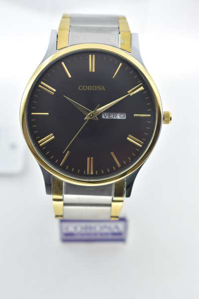 Presenting our Gold Two-Tone Plated Men's Wrist Watch, a blend of elegance and practicality. The seamless integration of gold and silver tones in the case is complemented by the inclusion of day and date functions, enhancing its functionality. Elevate your style with this exceptional timepiece, where timeless sophistication meets useful features, creating a statement of refined masculinity that's as versatile as it is distinctive.