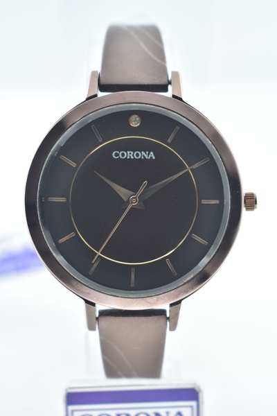 Introducing our Brown Plated Women's Wrist Watch, a harmonious blend of classic charm and modern style. The rich brown-plated case exudes a sense of warmth and elegance, making a statement that's both versatile and refined. Elevate your look with this exceptional timepiece, where traditional design meets contemporary aesthetics, resulting in a watch that's perfect for adding a touch of sophistication to any outfit.