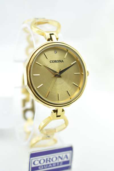 Presenting our Gold Plated Women's Wrist Watch, a fusion of elegance and luxury. The radiant gold-plated case embraces a captivating design, exuding sophistication. Elevate your style with this exquisite timepiece, where opulence meets femininity, creating a statement of refined taste for every occasion.